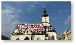 ザグレブで有名な聖マルコ教会の屋根に施されている、クロアチア・スラヴォニア・ダルマチア王国の紋章(左)とザグレブの紋章(右)